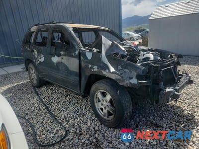 Czwarte zdjęcie samochodu z boku: 2005 JEEP GRAND CHEROKEE LAREDO VIN:1J4GS48K35C691885 - miniatura