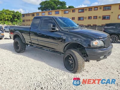 Czwarte zdjęcie samochodu z boku: 2000 FORD F150 VIN:1FTRX18LXYNA24361 - miniatura