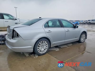 Trzecie zdjęcie samochodu z tyłu: 2010 FORD FUSION HYBRID VIN:3FADP0L32AR151299 - miniatura