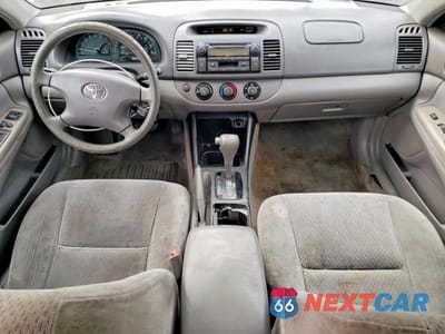 Zdjęcie 8 z 11 samochodu: 2004 TOYOTA CAMRY LE VIN:4T1BE32K94U323144 - miniatura