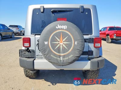 Zdjęcie 6 z 12 samochodu: 2013 JEEP WRANGLER UNLIMITED SAHARA VIN:1C4BJWEG5DL617770 - miniatura