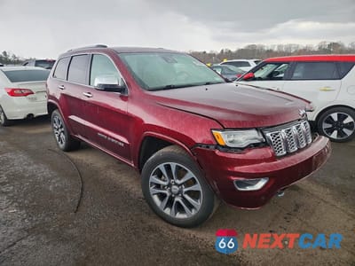 Czwarte zdjęcie samochodu z boku: 2017 JEEP GRAND CHEROKEE OVERLAND VIN:1C4RJECG9HC813213 - miniatura