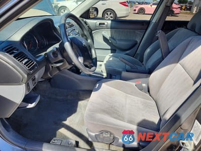 Zdjęcie 7 z 13 samochodu: 2004 HONDA CIVIC LX VIN:2HGES16574H533748 - miniatura