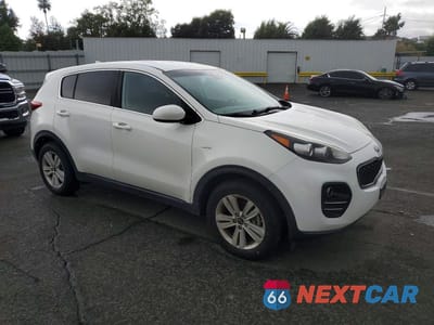 Czwarte zdjęcie samochodu z boku: 2017 KIA SPORTAGE LX VIN:KNDPMCAC8H7067946 - miniatura
