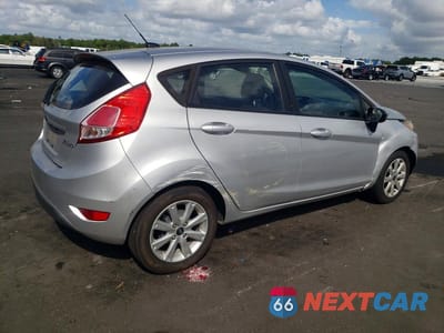 Trzecie zdjęcie samochodu z tyłu: 2018 FORD FIESTA SE VIN:3FADP4EJ1JM128211 - miniatura