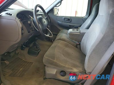 Zdjęcie 7 z 12 samochodu: 1999 FORD F150 VIN:2FTRX18W4XCA24628 - miniatura