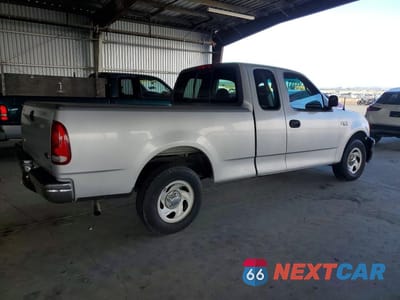 Trzecie zdjęcie samochodu z tyłu: 1999 FORD F150 VIN:1FTZX1729XNB93259 - miniatura