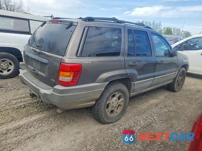 Trzecie zdjęcie samochodu z tyłu: 1999 JEEP GRAND CHEROKEE LAREDO VIN:1J4GW58N9XC804505 - miniatura