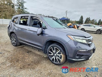 Czwarte zdjęcie samochodu z boku: 2022 HONDA PILOT TOURING VIN:5FNYF5H67NB029186 - miniatura
