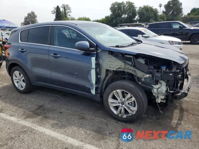 Czwarte zdjęcie samochodu z boku: 2017 KIA SPORTAGE LX VIN:KNDPMCAC7H7067968 - miniatura