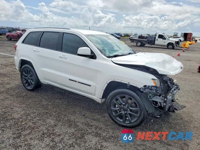 Czwarte zdjęcie samochodu z boku: 2021 JEEP GRAND CHEROKEE LAREDO VIN:1C4RJFAG6MC808456 - miniatura