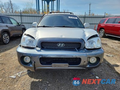 Piąte zdjęcie samochodu w środku: 2003 HYUNDAI SANTA FE GLS VIN:KM8SC73D93U478210 - miniatura