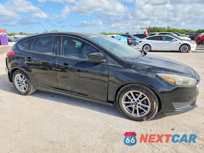 Czwarte zdjęcie samochodu z boku: 2016 FORD FOCUS SE VIN:1FADP3K25GL383848 - miniatura