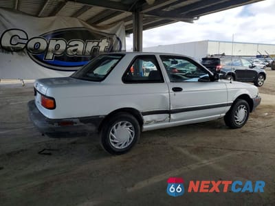 Trzecie zdjęcie samochodu z tyłu: 1992 NISSAN SENTRA E VIN:1N4EB32A0NC742076 - miniatura