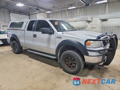 Czwarte zdjęcie samochodu z boku: 2005 FORD F150 VIN:1FTPX14525FA54040 - miniatura