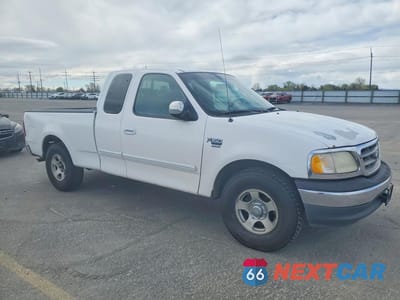 Czwarte zdjęcie samochodu z boku: 2000 FORD F150 VIN:1FTRX17L1YKA73161 - miniatura
