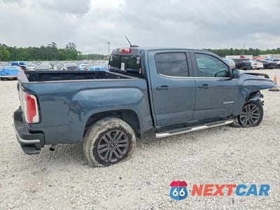Trzecie zdjęcie samochodu z tyłu: 2019 GMC CANYON SLE VIN:1GTG5CEN2K1353813 - miniatura