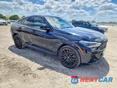 Czwarte zdjęcie samochodu z boku: 2023 BMW X6 XDRIVE40I VIN:5UXCY6C06P9R02080 - miniatura