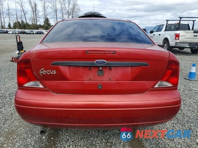 Zdjęcie 6 z 13 samochodu: 2004 FORD FOCUS LX VIN:1FAFP33P14W132192 - miniatura