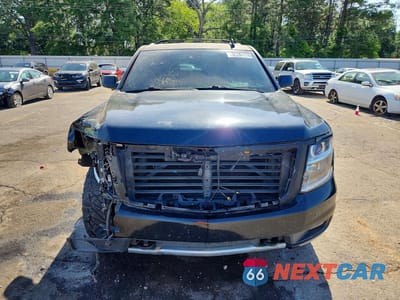 Piąte zdjęcie samochodu w środku: 2017 CHEVROLET SUBURBAN K1500 LT VIN:1GNSKHKC4HR272218 - miniatura