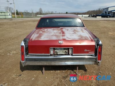 Zdjęcie 6 z 12 samochodu: 1986 CADILLAC FLEETWOOD BROUGHAM VIN:1G6DW69YXG9739087 - miniatura