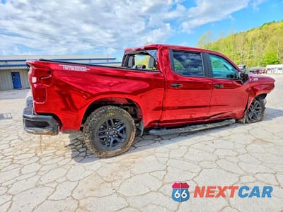 Trzecie zdjęcie samochodu z tyłu: 2023 CHEVROLET SILVERADO K1500 LT TRAIL BOSS VIN:3GCUDFED9PG263047 - miniatura