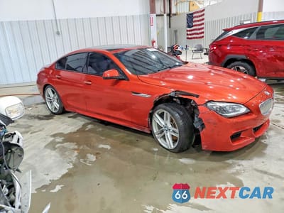 Czwarte zdjęcie samochodu z boku: 2014 BMW 650 XI GRAN COUPE VIN:WBA6B4C53ED371587 - miniatura