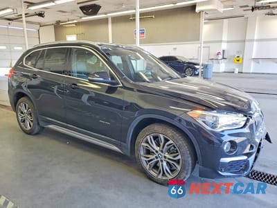 Czwarte zdjęcie samochodu z boku: 2016 BMW X1 XDRIVE28I VIN:WBXHT3Z35G4A49227 - miniatura
