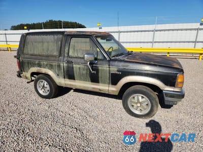Czwarte zdjęcie samochodu z boku: 1989 FORD BRONCO II VIN:1FMCU14T3KUA35621 - miniatura