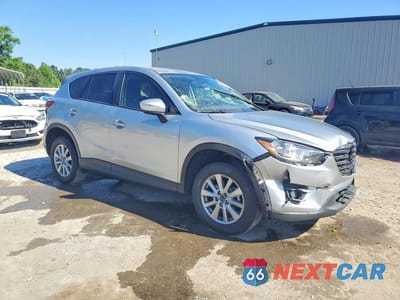 Czwarte zdjęcie samochodu z boku: 2016 MAZDA CX-5 TOURING VIN:JM3KE2CY6G0864981 - miniatura