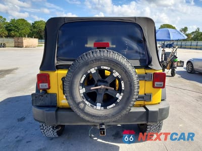 Zdjęcie 6 z 13 samochodu: 2009 JEEP WRANGLER UNLIMITED X VIN:1J4GA39169L700197 - miniatura