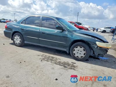 Czwarte zdjęcie samochodu z boku: 2000 HONDA ACCORD LX VIN:1HGCG564XYA030775 - miniatura