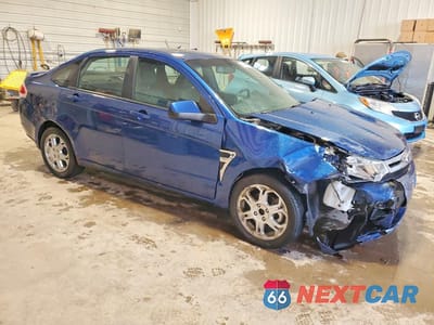 Czwarte zdjęcie samochodu z boku: 2008 FORD FOCUS SE VIN:1FAHP35N38W244972 - miniatura