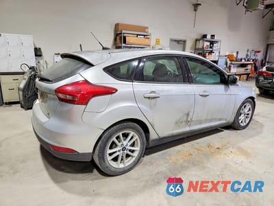 Trzecie zdjęcie samochodu z tyłu: 2015 FORD FOCUS VIN:1FADP3K28FL304087 - miniatura