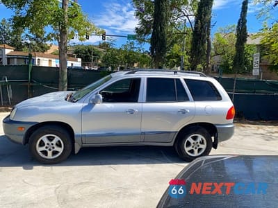 Zdjęcie 13 z 14 samochodu: 2001 HYUNDAI SANTA FE GL VIN:KM8SC83D01U126863 - miniatura