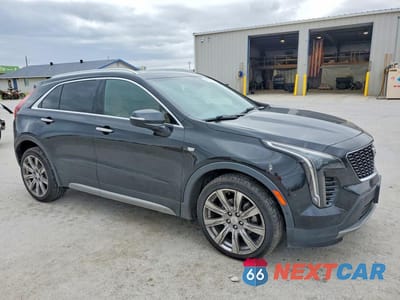 Czwarte zdjęcie samochodu z boku: 2019 CADILLAC XT4 PREMIUM LUXURY VIN:1GYFZCR46KF104607 - miniatura