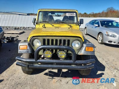 Piąte zdjęcie samochodu w środku: 2000 JEEP WRANGLER / TJ SPORT VIN:1J4FA49S1YP712176 - miniatura