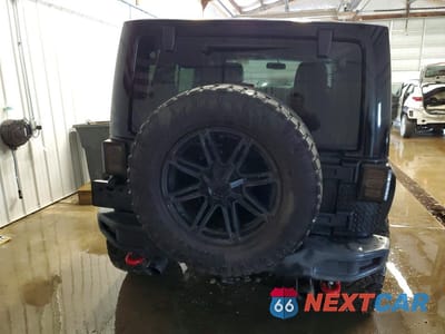 Zdjęcie 6 z 13 samochodu: 2013 JEEP WRANGLER UNLIMITED RUBICON VIN:1C4HJWFG5DL651684 - miniatura