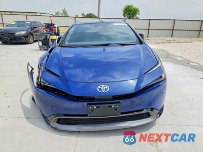 Piąte zdjęcie samochodu w środku: 2025 TOYOTA PRIUS XLE VIN:JTDACAAU5S3057864 - miniatura