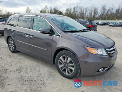 Czwarte zdjęcie samochodu z boku: 2014 HONDA ODYSSEY TOURING VIN:5FNRL5H99EB038057 - miniatura
