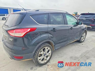 Trzecie zdjęcie samochodu z tyłu: 2014 FORD ESCAPE TITANIUM VIN:1FMCU0J93EUB10180 - miniatura