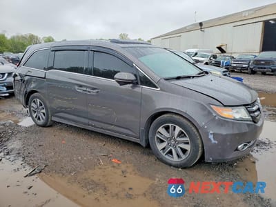Czwarte zdjęcie samochodu z boku: 2016 HONDA ODYSSEY TOURING VIN:5FNRL5H97GB005318 - miniatura