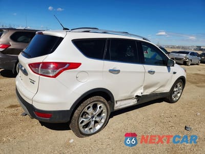 Trzecie zdjęcie samochodu z tyłu: 2014 FORD ESCAPE TITANIUM VIN:1FMCU9J92EUD90033 - miniatura