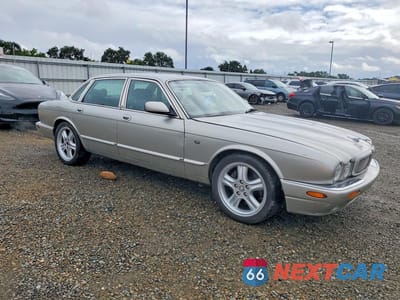 Czwarte zdjęcie samochodu z boku: 1999 JAGUAR XJR VIN:SAJPX1847XC854663 - miniatura