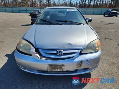 Piąte zdjęcie samochodu w środku: 2002 HONDA CIVIC LX VIN:1HGEM22582L110795 - miniatura