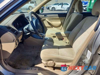 Zdjęcie 7 z 12 samochodu: 2004 HONDA CIVIC LX VIN:1HGES16564L018811 - miniatura