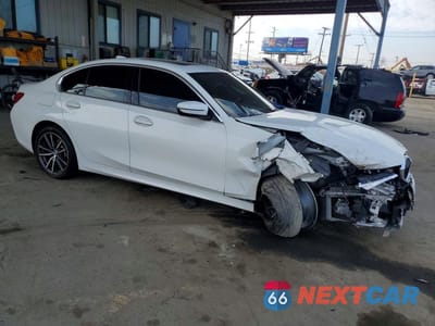 Czwarte zdjęcie samochodu z boku: 2021 BMW 330E VIN:3MW5P7J06M8B56027 - miniatura