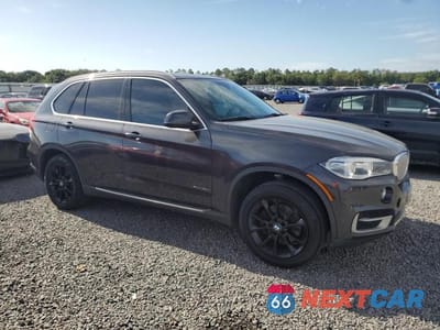 Czwarte zdjęcie samochodu z boku: 2016 BMW X5 XDR40E VIN:5UXKT0C53G0S77063 - miniatura