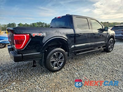 Trzecie zdjęcie samochodu z tyłu: 2023 FORD F150 SUPERCREW VIN:1FTFW1E87PFB92957 - miniatura