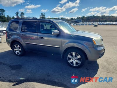 Czwarte zdjęcie samochodu z boku: 2012 HONDA PILOT TOURING VIN:5FNYF4H94CB013142 - miniatura